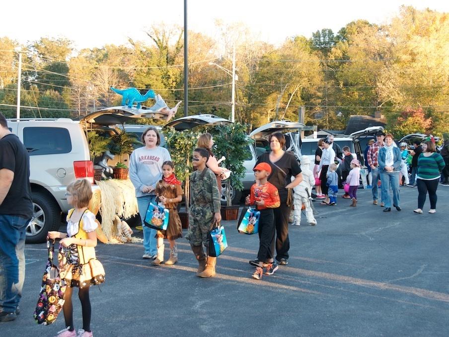 People gather at a trunk-or-treat in 2014.