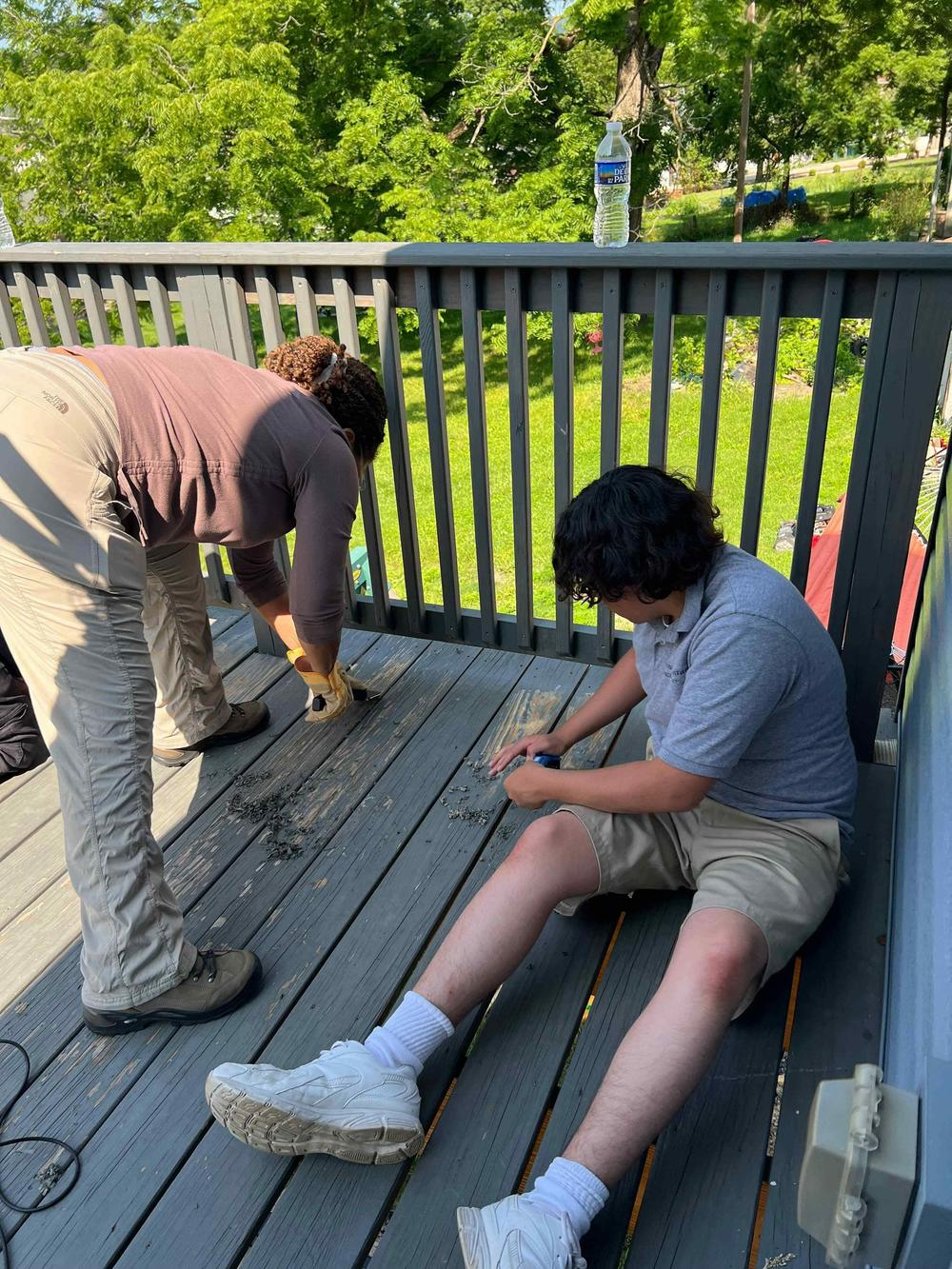 An incarcerated youth held at Backbone Mountain Youth Center in western Maryland participates in a community service project, with help from NPR's Michel Martin.