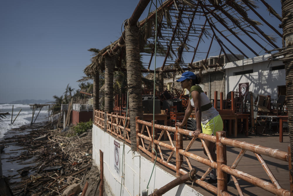 <strong>Oct. 29:</strong> A woman stands at a damaged area in the aftermath of Hurricane Otis in Acapulco, Mexico.