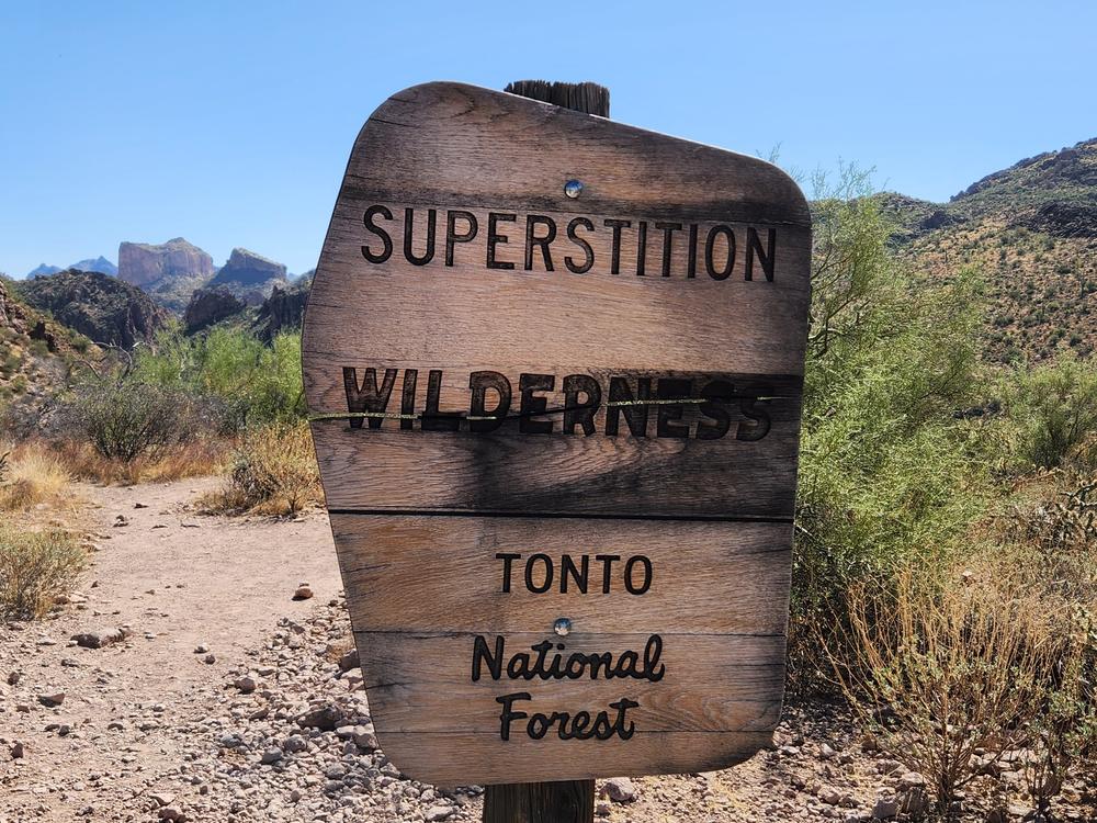 The Superstition Wilderness east of Phoenix, Arizona, extends over 140,000 acres of rugged desert and mountains.  Adequate preparation, maps and outdoor skills are required.