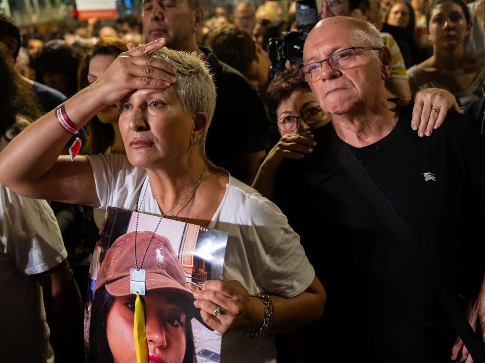 Families of kidnapped hostages join thousands of supporters in a protest to demand that Israeli Prime Minister Benjamin Netanyahu secure the release of Israeli hostages on Saturday in Tel Aviv, Israel.