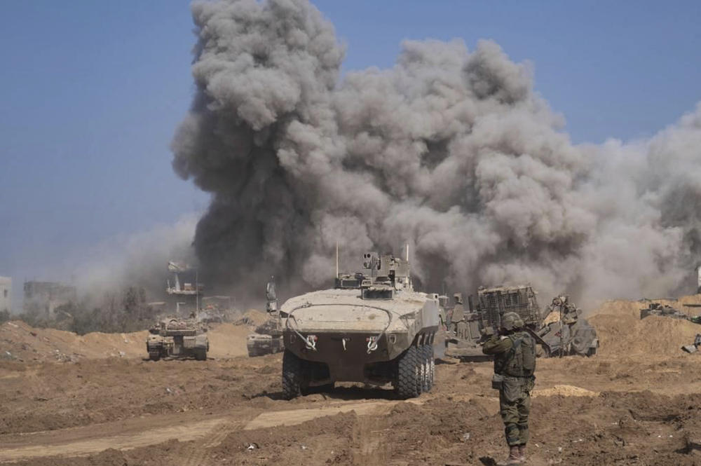 Israeli troops operate inside the Gaza Strip on Sunday in this photo provided by the Israeli military. Israel says it will not allow Hamas to rule Gaza in the future, but it's unclear who might be in charge in the territory.