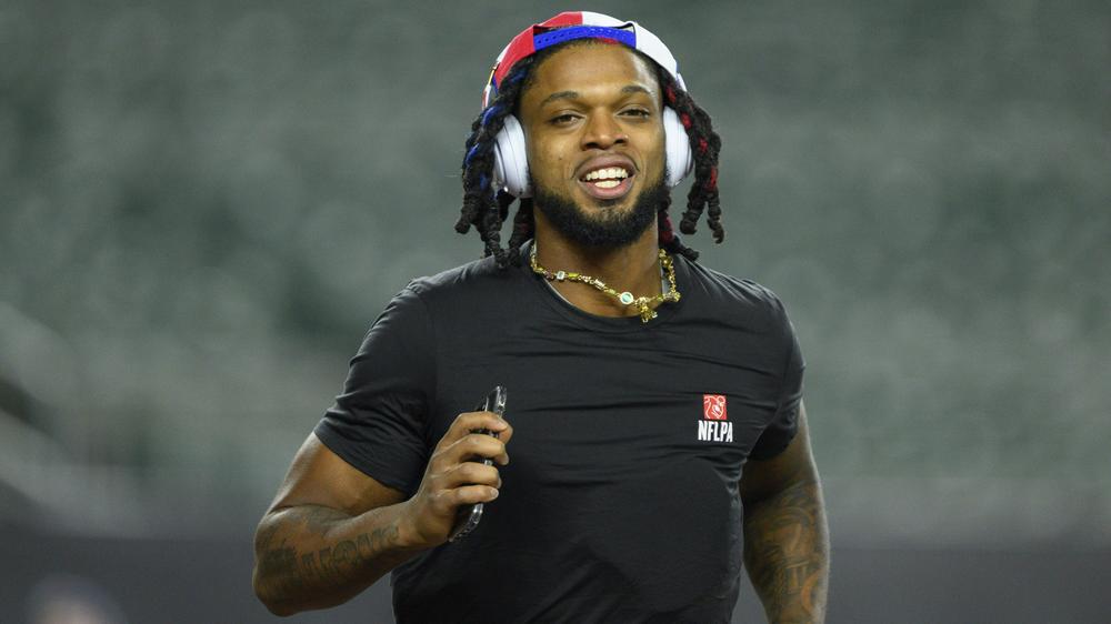 The Buffalo Bills' Damar Hamlin took 10 Cincinnati medical workers out for dinner — and told them he's setting up scholarships in their names. He's seen here before the Bills' game against the Cincinnati Bengals.