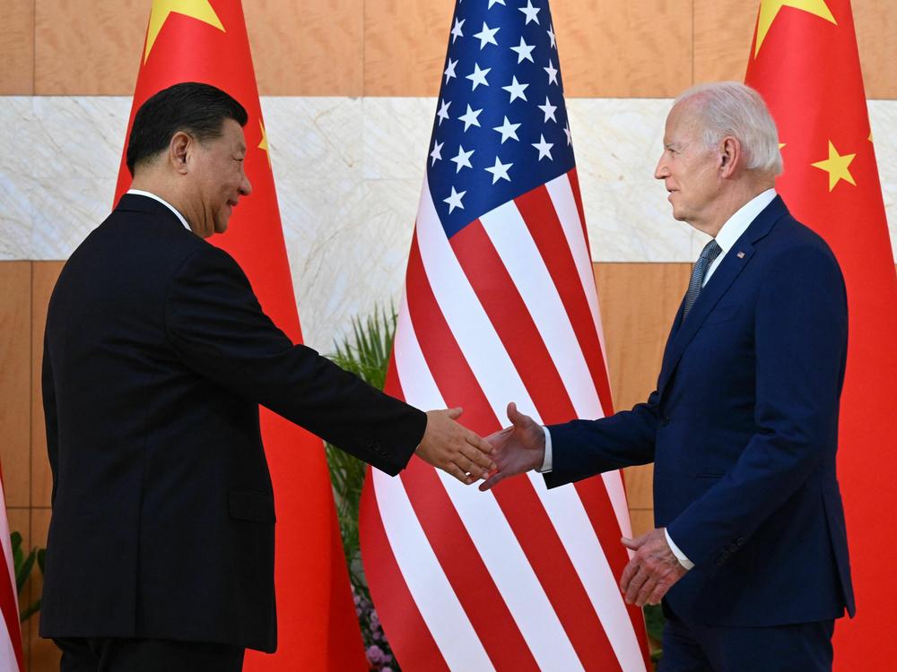 President Biden and China's President Xi Jinping shake hands as they meet on the sidelines of the G-20 summit in Nusa Dua on the Indonesian resort island of Bali on Nov. 14, 2022.