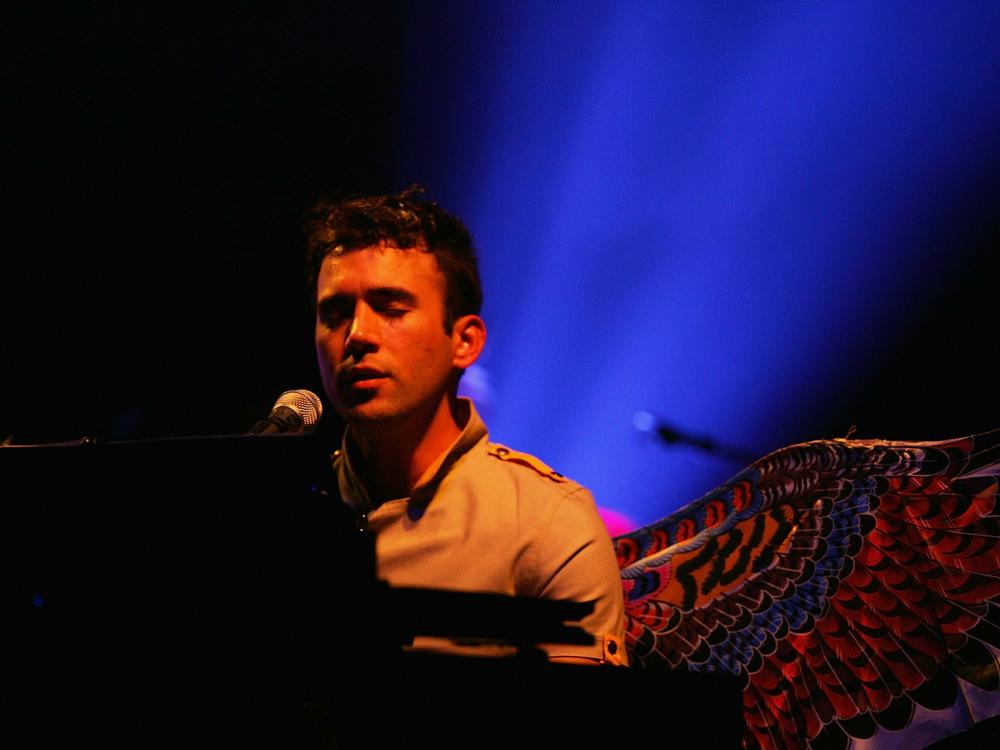 Sufjan Stevens performs on his piano during a 2006 concert at the Wiltern Theater in Los Angeles, California.