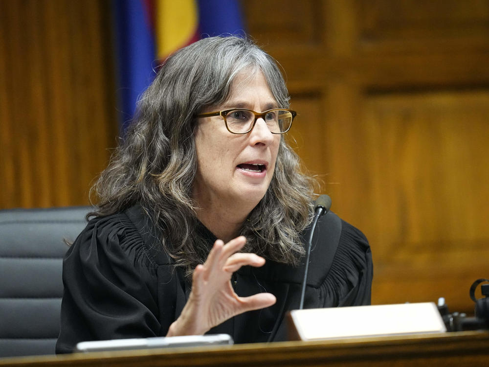 Judge Sarah B. Wallace presides over closing arguments on Nov. 15, 2023 in Denver in a hearing for a lawsuit to keep former President Donald Trump off the state ballot.
