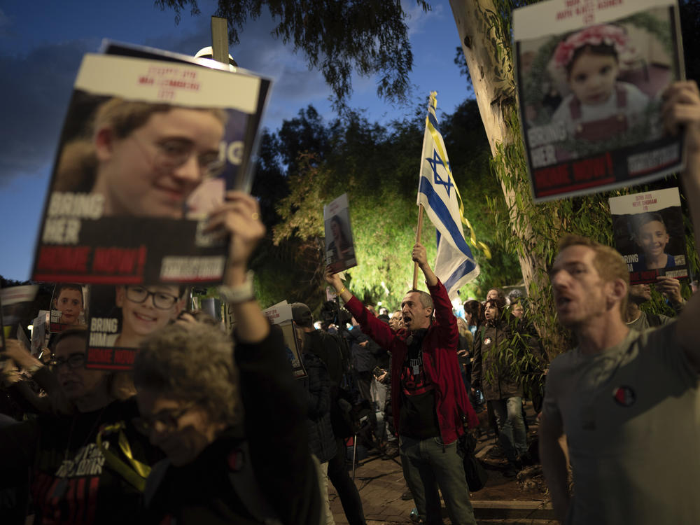 Demonstrators call for the return of 40 children who are among the roughly 240 hostages believed held by Hamas militants in the Gaza Strip as they mark World Children's Day during a protest across from UNICEF offices in Tel Aviv, Israel, on Monday.