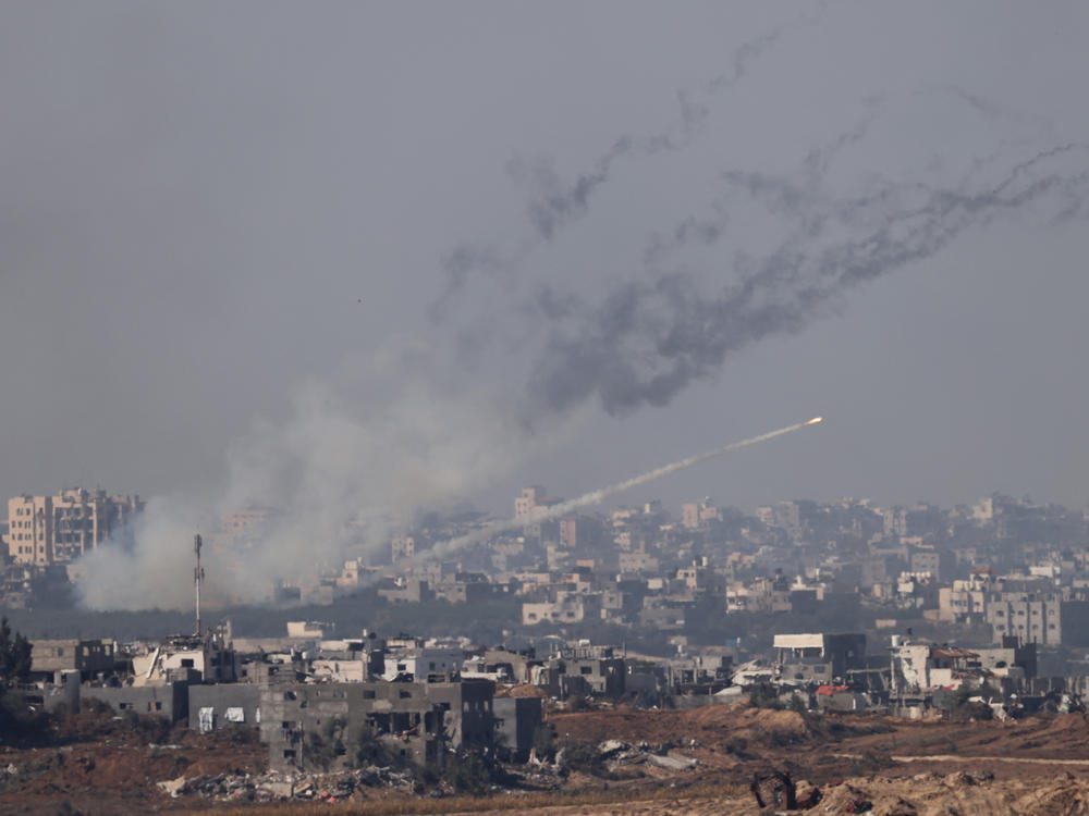 A rocket is fired from inside the Gaza Strip towards Israel, as battles resumed between the Israeli forces and Hamas militants on Friday.