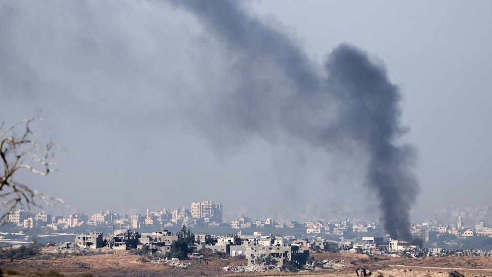 A picture taken from southern Israel near the border with the Gaza Strip on Saturday shows smoke billowing over the Palestinian territory as a result of Israel's bombardment of the Palestinian territory.