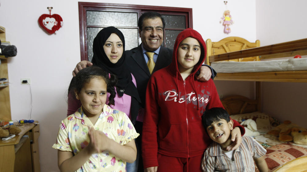 Palestinian Dr. Izzeldin Abuelaish with four of his five surviving children in Gaza in May 2009. Several months earlier, an Israeli tank shell killed three of his daughters in their home. Abuelaish has worked in Israeli and Palestinian hospitals and is an outspoken advocate for peace. He now lives in Canada, but on Nov. 7, an Israeli airstrike killed 22 members of his extended family in Gaza.