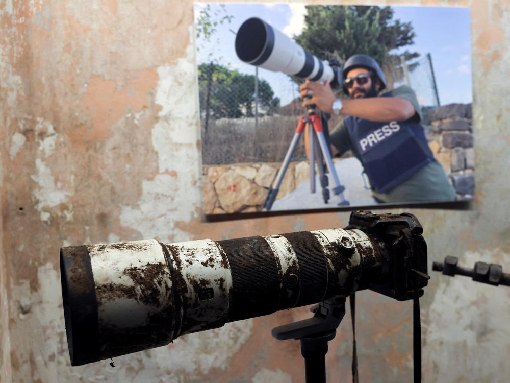 The camera that belonged to Reuters journalist Issam Abdallah, who was killed by what a Reuters investigation has found was an Israeli tank crew, is displayed during a press conference by Amnesty International and Human Rights Watch in Beirut, Lebanon, on Thursday.