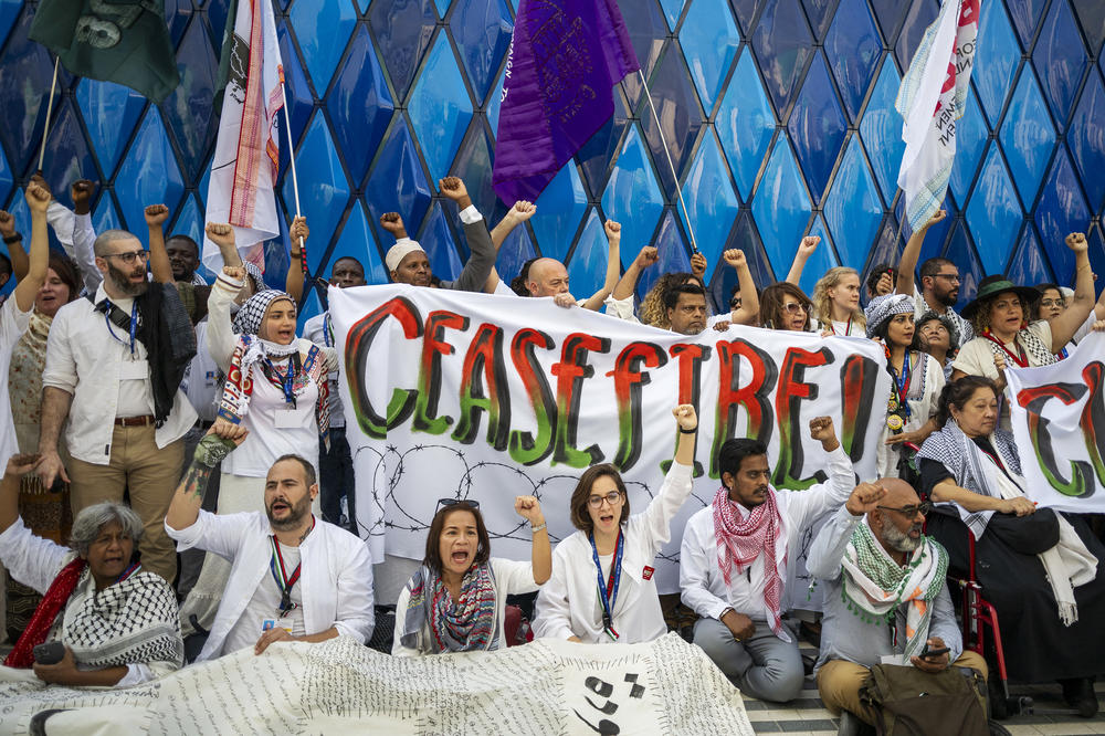 Participants shout slogans during a demonstration demanding a ceasefire in the Israel-Hamas war.