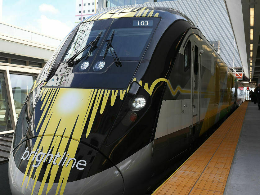 A Brightline train during its inaugural trip between Miami and West Palm Beach, Fla., in 2018. This week, the White House announced $3 billion in funding for Brightline West, a proposed high-speed rail line connecting Las Vegas and Southern California.
