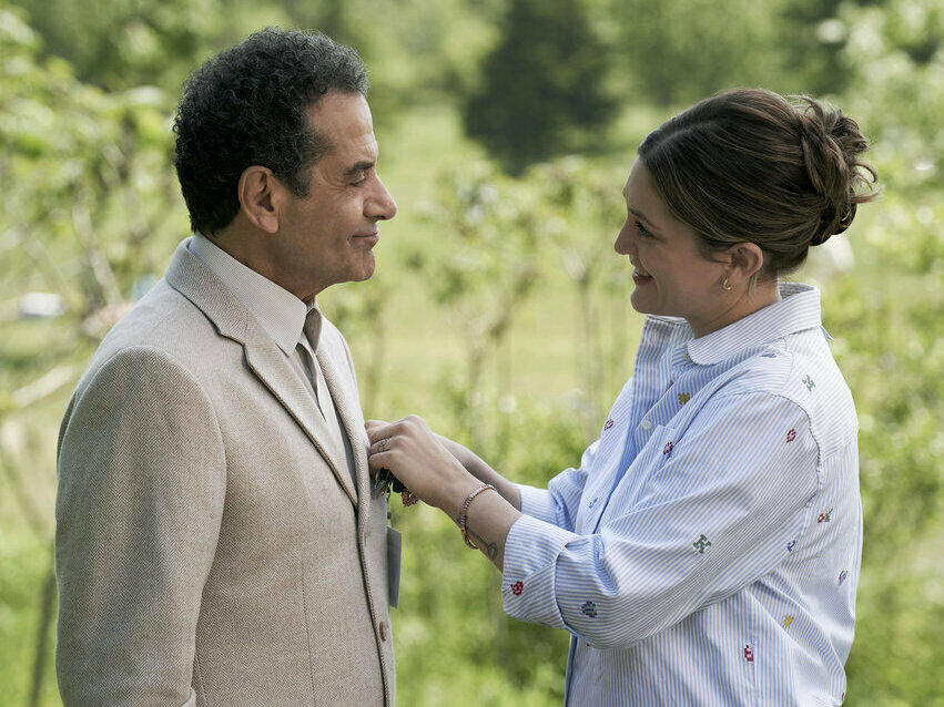 Molly (Caitlin McGee) helps look after Monk (Tony Shalhoub) in <em>Mr. Monk's Last Case.</em>