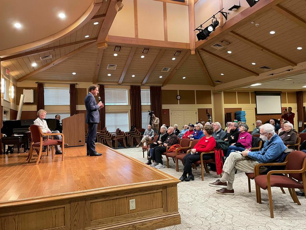 Rep. Dean Phillips, D-Minn., speaks to residents at the RiverWoods retirement community in Exeter, N.H. on Dec. 8, 2023.