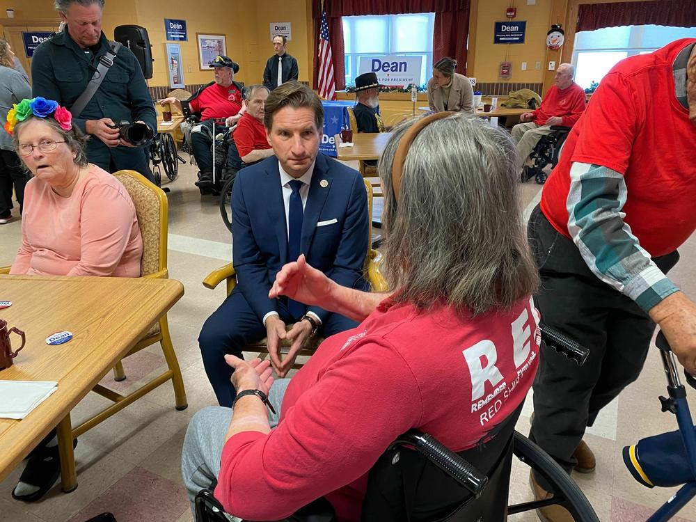 Rep. Dean Phillips, D-Minn., talks to residents at the New Hampshire Veterans Home in Tilton, N.H. on December 8, 2023.