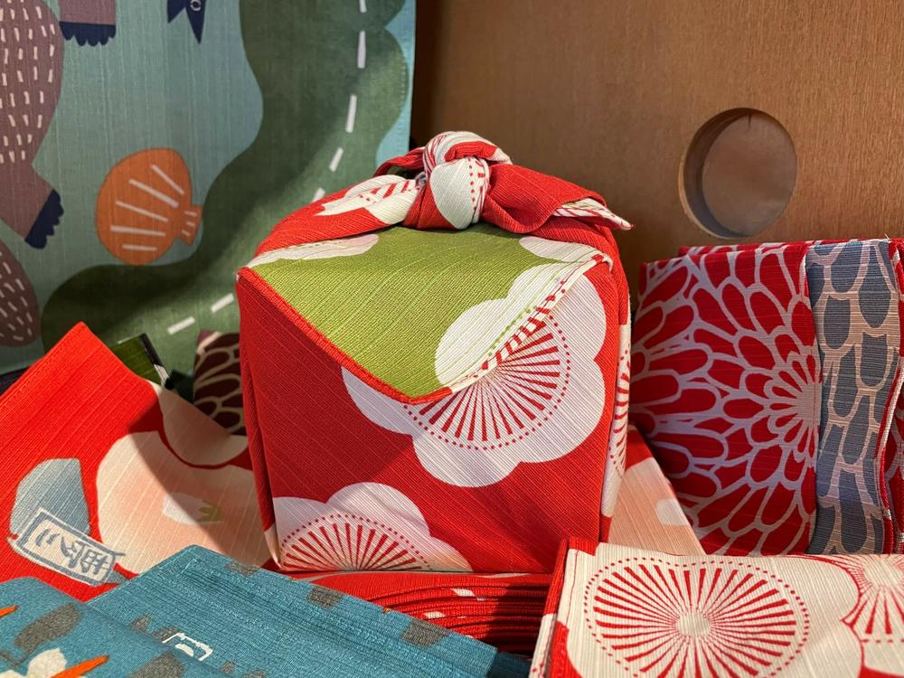 A box wrapped in the furoshiki style is part of a display at the gift shop inside the Los Angeles museum, Craft Contemporary, Dec. 2, 2023.