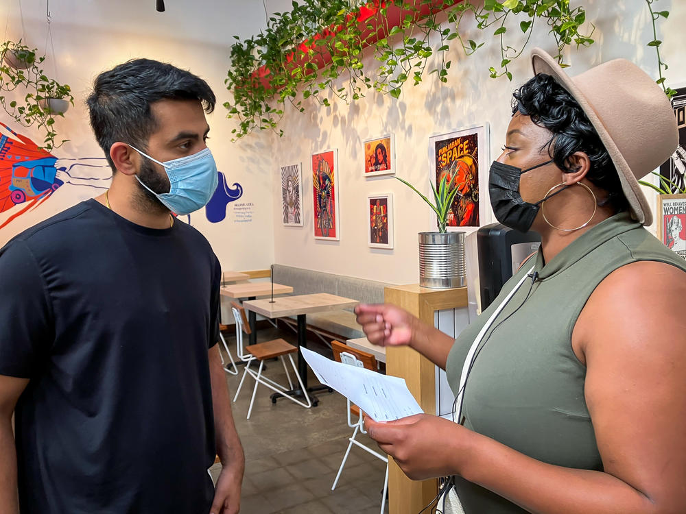 Monet Burpee (right) talks to the manager of a restaurant in Redwood City, CA on one of the job-scouting expeditions she undertakes on behalf of patients receiving a suite of interventions and services for psychosis.