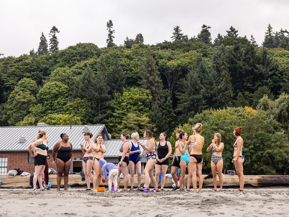 Rain or shine, the cold plunge crew gathers just ahead of 8 a.m. on Sunday mornings in front of the bathhouse at Seattle's Golden Gardens Park. Entering the water is a communal activity, how long you stay is up to you.