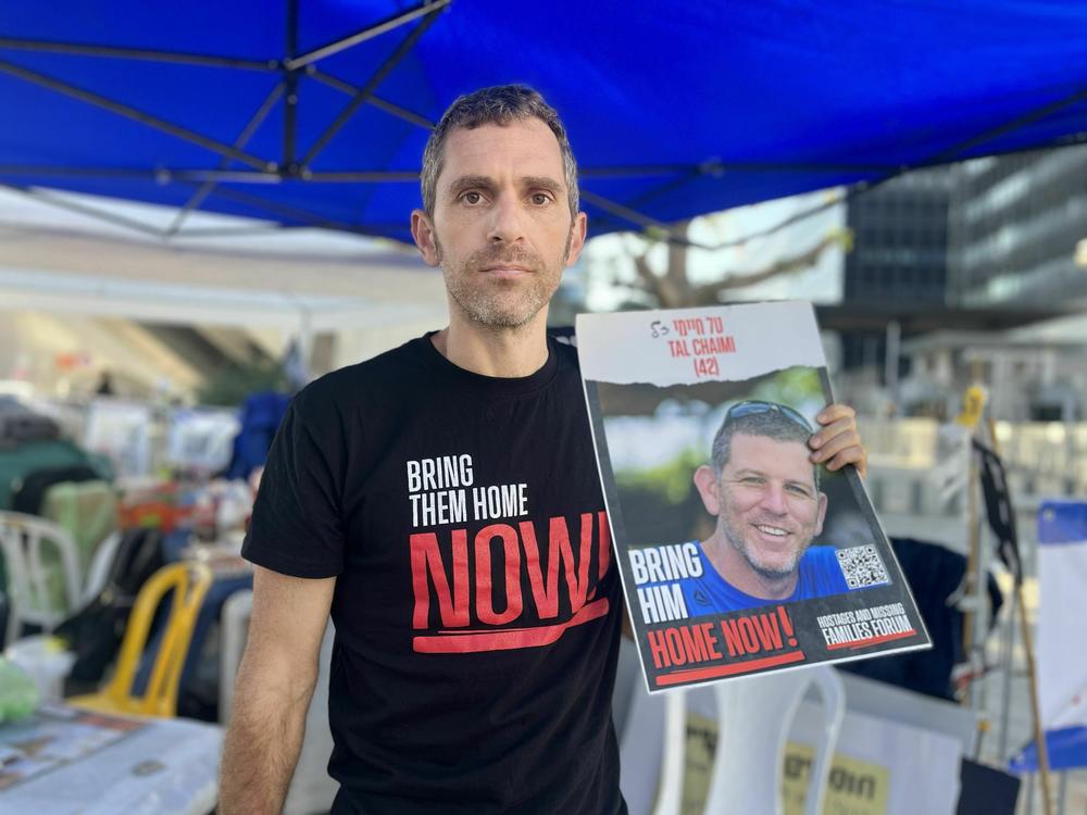 Udi Goren is among the families and supporters of Israelis held in Gaza who are protesting outside Israel's military headquarters, demanding that Israel change its war strategy.