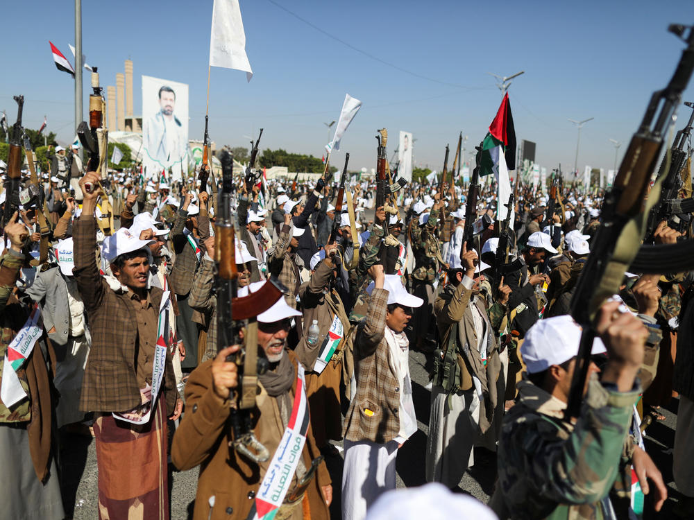 Newly recruited fighters who joined a Houthi military force intended to be sent to fight in support of the Palestinians in the Gaza Strip, march during a parade in Sanaa, Yemen