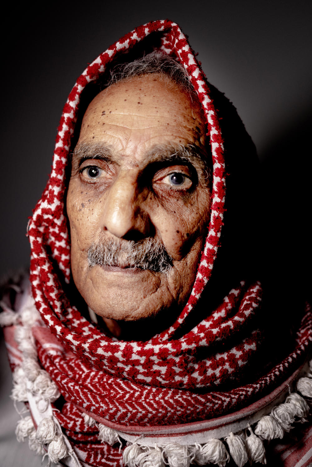 84-year-old Mohammed Suleiman Khader lived through what Palestinians call the Nakba — the catastrophe — of 1948. That year, his family fled their village near what is now Tel Aviv, and came to Al-Am'ari refugee camp in Ramallah, where they've lived ever since. 