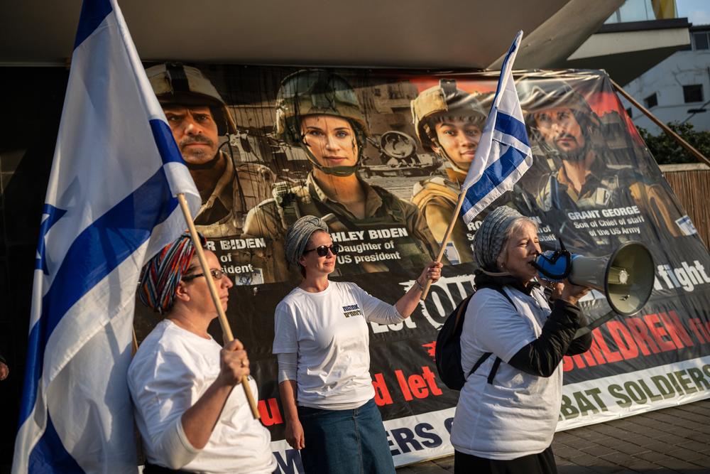 Rina Shamir, whose son and husband are serving in Gaza, speaks during a small demonstration in Tel Aviv supporting the war, during U.S. Secretary of State Antony Blinken's visit to the region on Jan. 9.