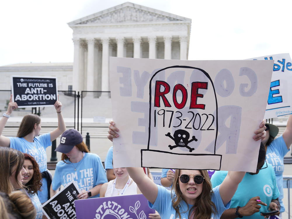 The scene at the U.S. Supreme Court on the day it overturned <em>Roe v. Wade</em> in June 2022. Researchers estimate that 64,565 rape-caused pregnancies have occurred in states that banned abortion since then.