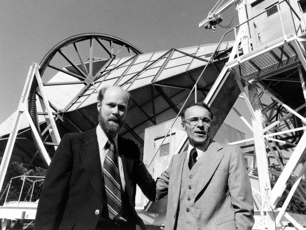 Arno Penzias (right) and Robert Woodrow Wilson, who co-discovered the afterglow of the Big Bang. The Bell Lab employees, who won the 1978 Nobel Prize in physics for their discovery, are shown standing in front of their microwave antenna at Bell Labs in Holmdel, N.J., on Oct. 17, 1978.