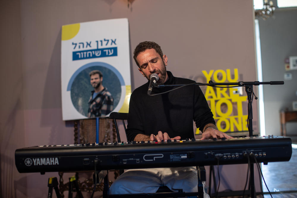 Israeli musician Shlomi Shaban performs at a concert for Alon Ohel, who was kidnapped by Hamas militants from the Nova music festival on Oct. 7 in Zikim, Israel, near the Gaza border on Jan. 21. The concert, which featured some of Alon's favorite musicians, was organized by his family and broadcast over giant speakers in the hopes that Alon would hear it from wherever he's being held.