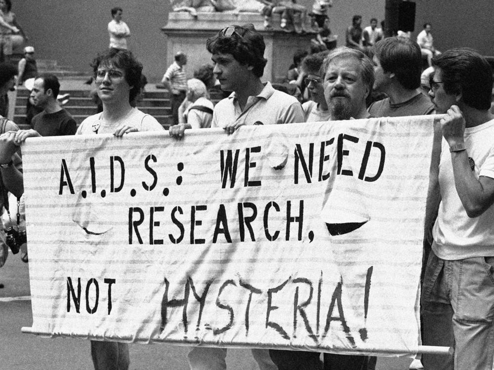 A group advocating AIDS research marches down Fifth Avenue during the Lesbian and Gay Pride parade in New York, June 26, 1983.