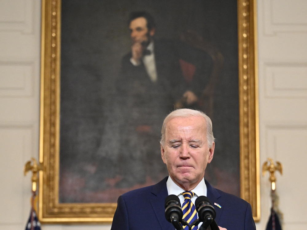 President Biden pauses in remarks in the State Dining Room on Feb. 6. Biden urged Congress to pass a Senate compromise bill with funding for the border, Ukraine and other national security priorities.