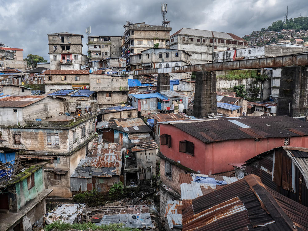 Buildings on a hillside in the Susan's Bay neighborhood of central Freetown, Sierra Leone. Many residents have turned to kush as a cheap and accessible escape from lives of grinding poverty.