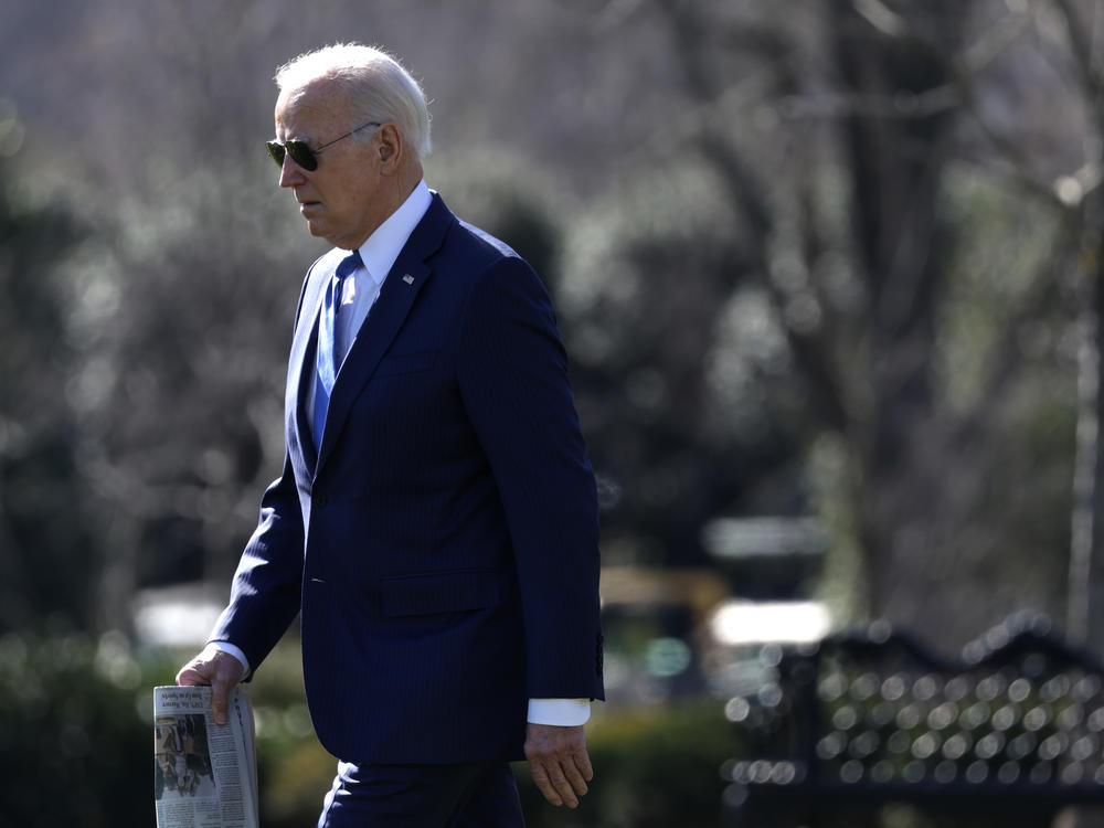 President Biden walks towards to the Marine One prior to a South Lawn departure from the White House on Wednesday.