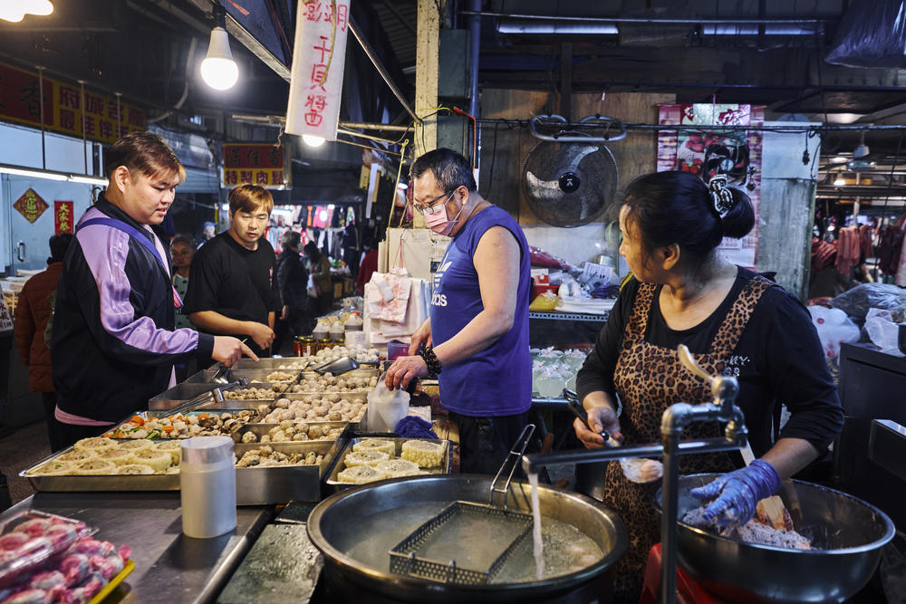 Fish balls vendors serve up the goods at Shuixian Gong Market.