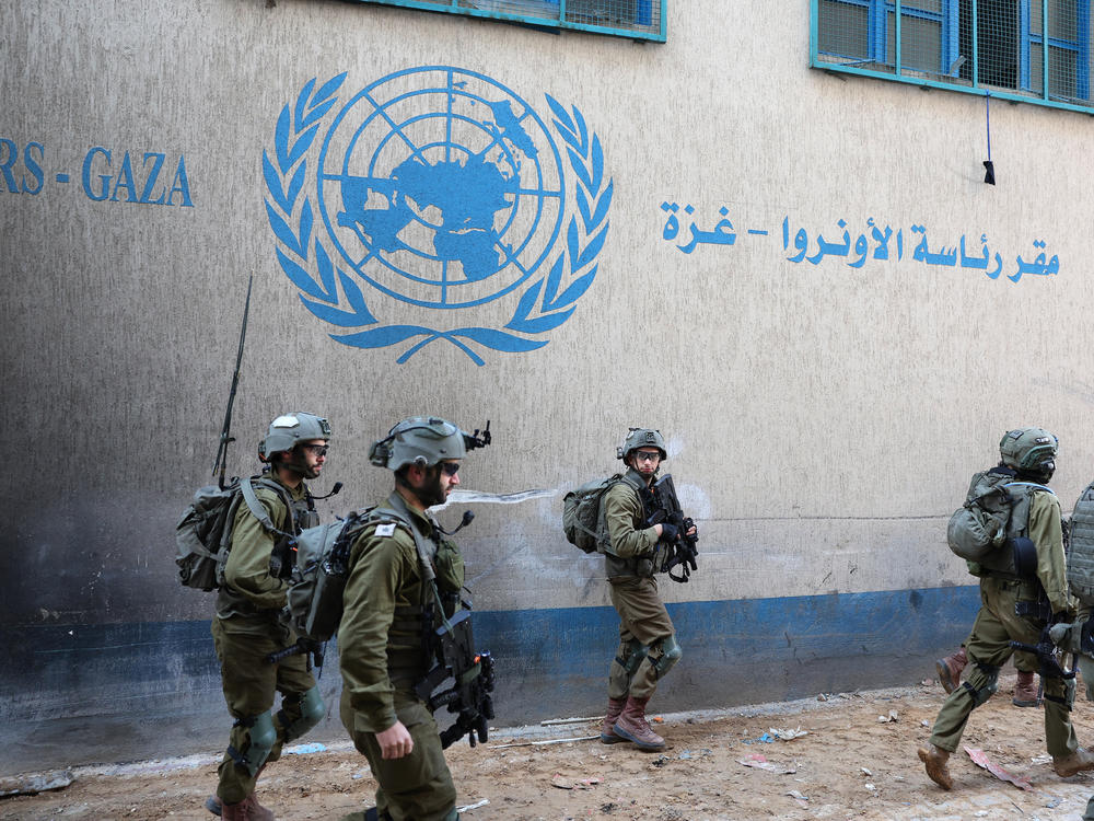 Israeli soldiers inside an evacuated compound of the UNRWA in Gaza City, amid ongoing fighting between Israel and the Palestinian militant group Hamas. This photo was taken during a controlled tour by the Israeli army on Feb. 8 and subsequently edited under the supervision of the Israeli military.