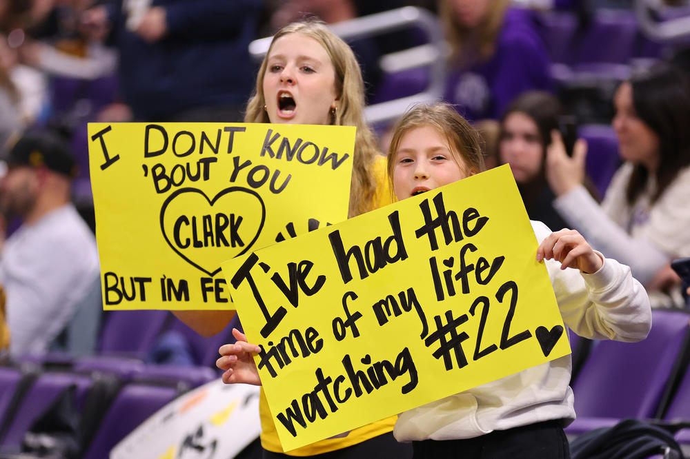 Young fans hold signs for Caitlin Clark prior to the game against the Northwestern Wildcats on Jan. 31, in Evanston, Ill.