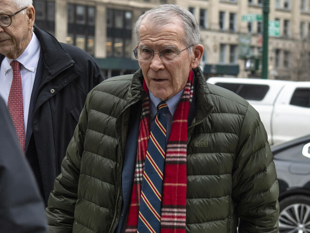 Oliver North enters court in Manhattan, Jan. 23, 2024, in New York. North, best known for his central role in the Iran-Contra scandal of the 1980s, who was pushed out as president of the National Rifle Association, was among the prominent witnesses to take the stand.