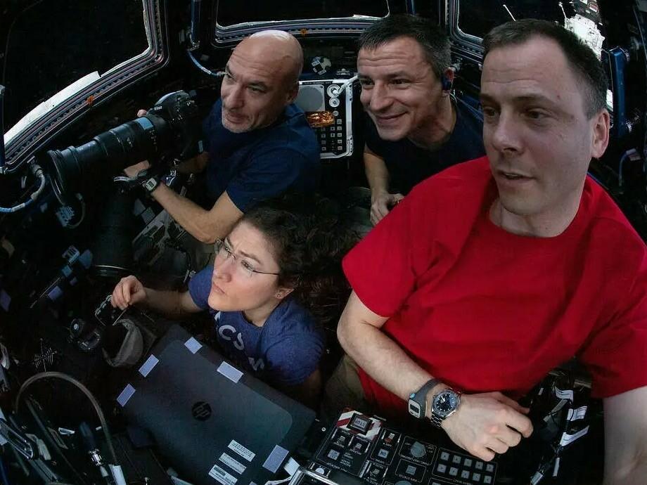 Expedition 60 crewmembers Luca Parmitano, Christina Koch, Andrew Morgan, and Nick Hague in the ISS cupola photographing Hurricane Dorian on August 30, 2019.