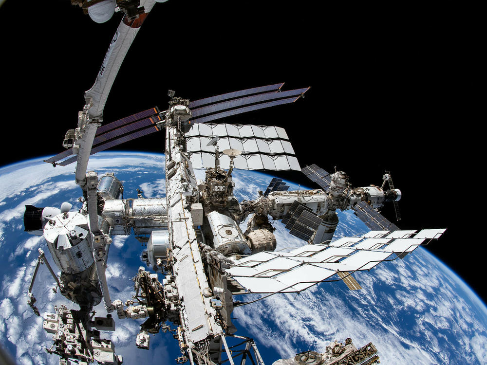 The view from NASA spacewalker Thomas Marshburn's camera points downward toward the ISS on December 2, 2021.