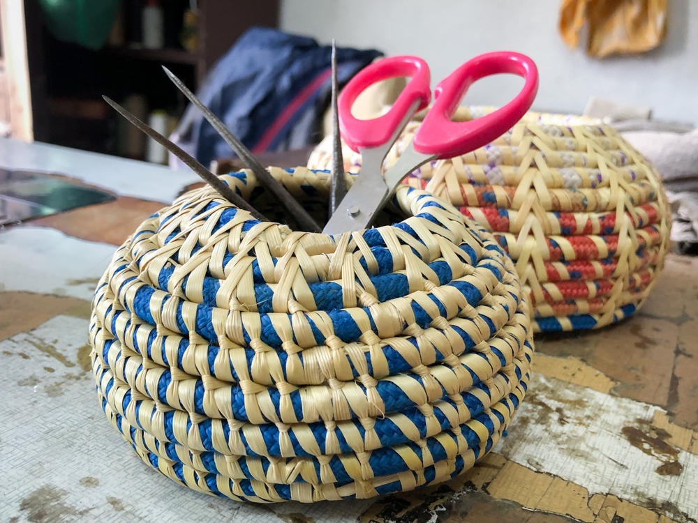 A box created by women crafters in Nepal, using ropes collected during the army-led Mountain Cleaning Campaign. Crafters are using this box to store their tools.