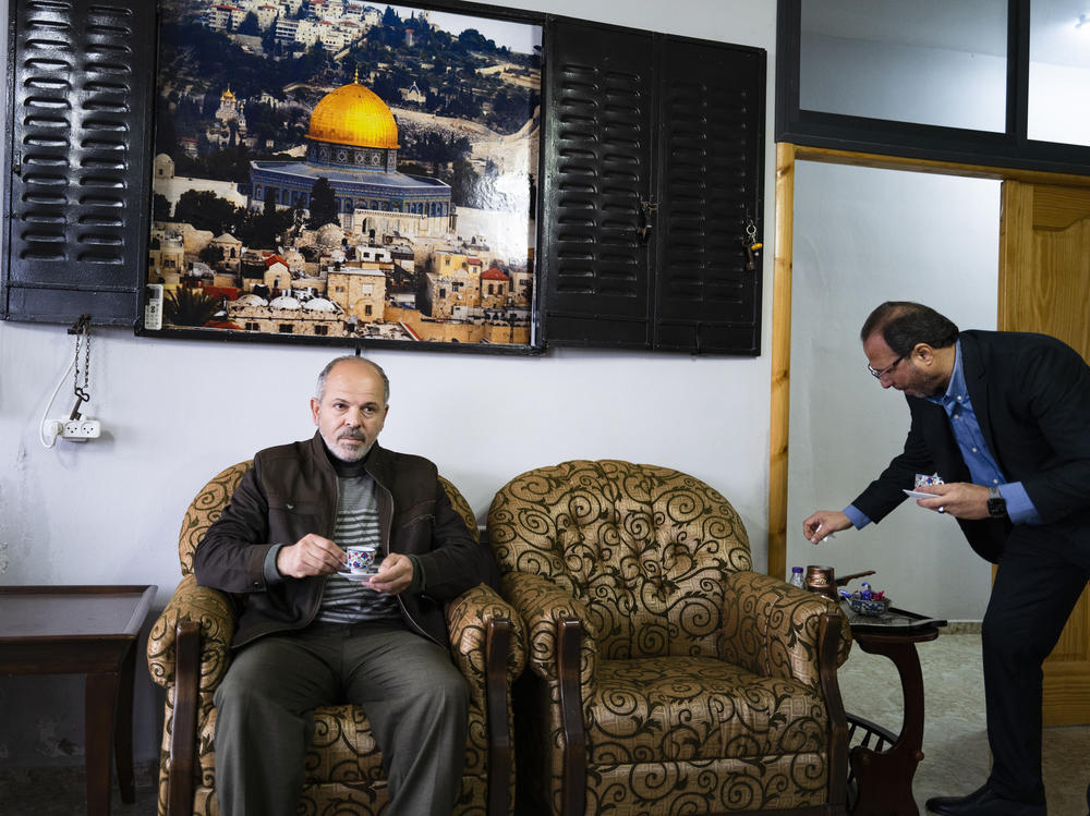 Raed Nimr Hamed, the mayor of Silwad, left, and Musa Hamed drink coffee in Musa Hamed's multi-story home in Silwad. Out of the roughly 8,000 people who live in Silwad, approximately 1,000 are Palestinian-Americans.