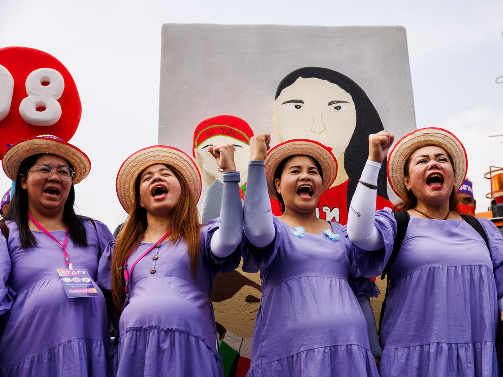 Photos from demonstrations around the world on International Women's ...