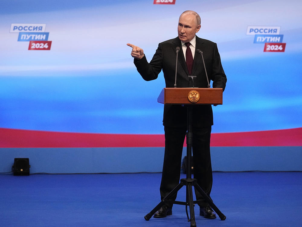 Russian President Vladimir Putin gestures while speaking on a visit to his campaign headquarters after a presidential election in Moscow.  What will another six years of Putin mean for Russia's war with Ukraine?
