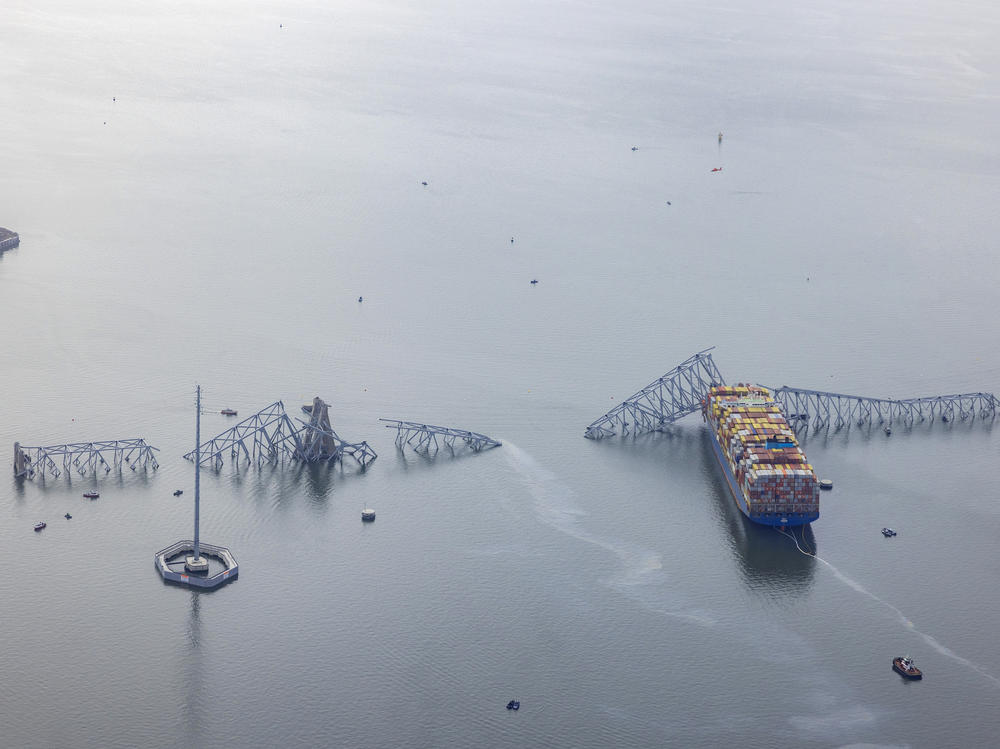 An aerial view of the cargo ship Dali after it ran into and collapsed the Francis Scott Key Bridge on March 26, 2024 in Baltimore, Maryland.