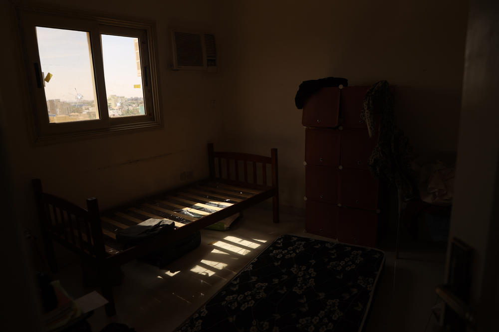 A bedroom with bullet holes through the window in Khartoum, Sudan, on April 18, 2023.