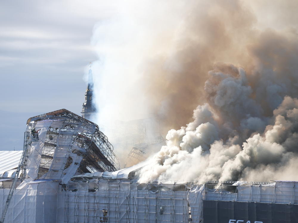 The roof of the 17th-century Old Stock Exchange, or Boersen, that was once Denmark's financial center was engulfed in flames Tuesday.