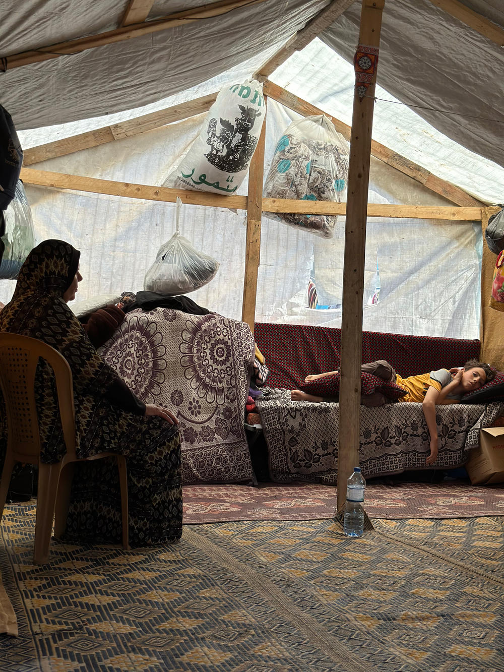 Nimer has been separated from his family, who are still in Gaza City. He is being cared for by his grandmother and uncle in a makeshift tent in a refugee camp in Rafah. They're trying to find better medical care for Nimer, who suffers from mild seizures and an ongoing fever since his surgery.