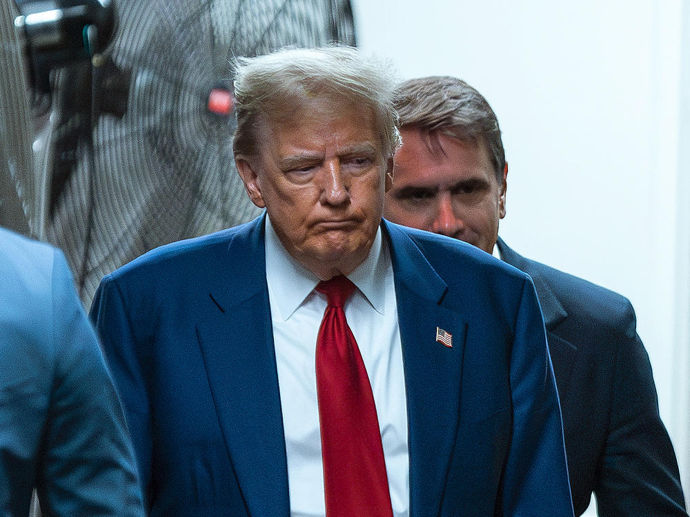 Former U.S. President Donald Trump returns to court during his trial for allegedly covering up hush money payments at Manhattan Criminal Court on April 30, 2024 in New York City.
