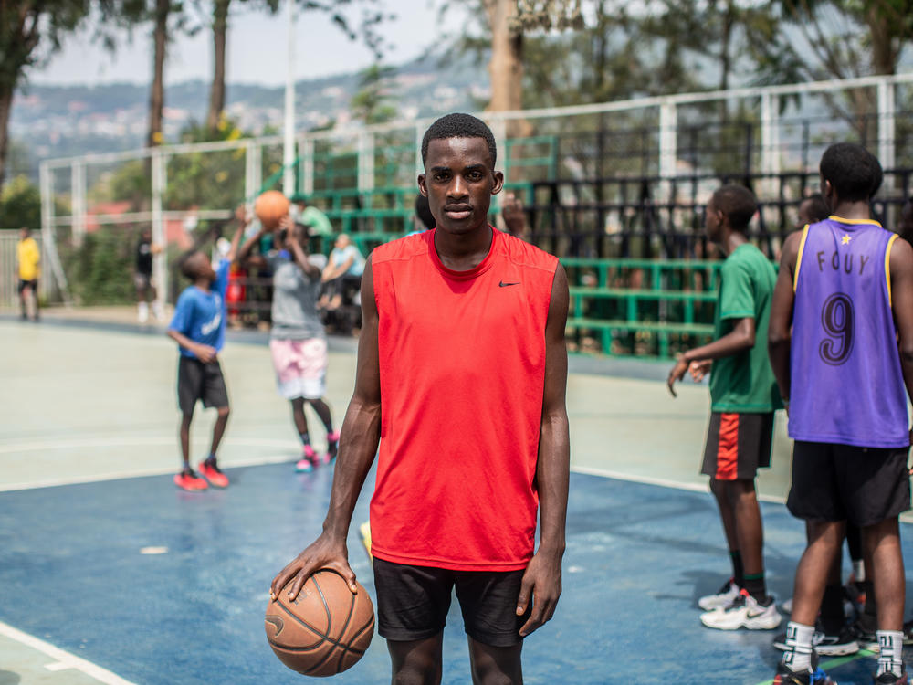 Yassin Nshimiyimana, 16, hopes basketball can make him famous.